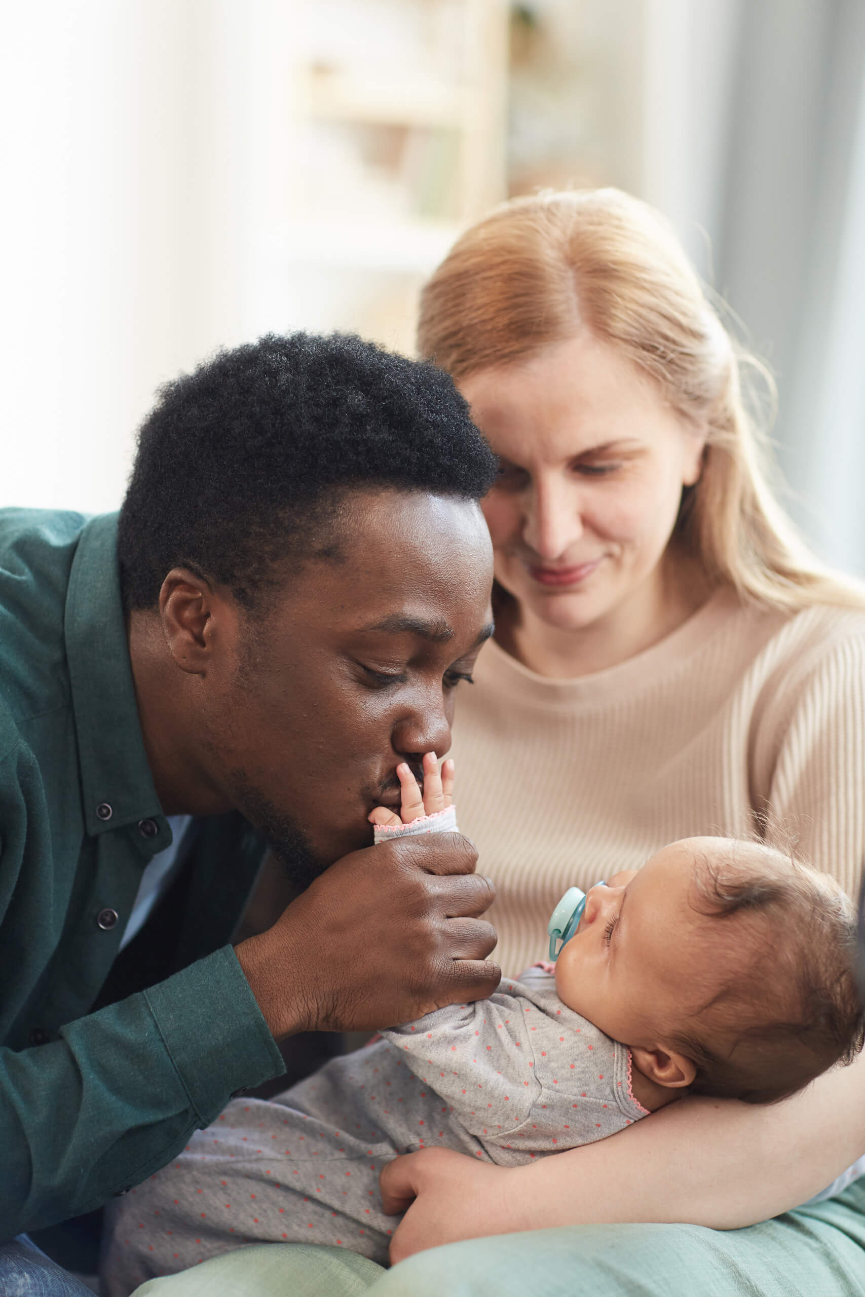 Happy couple with their baby