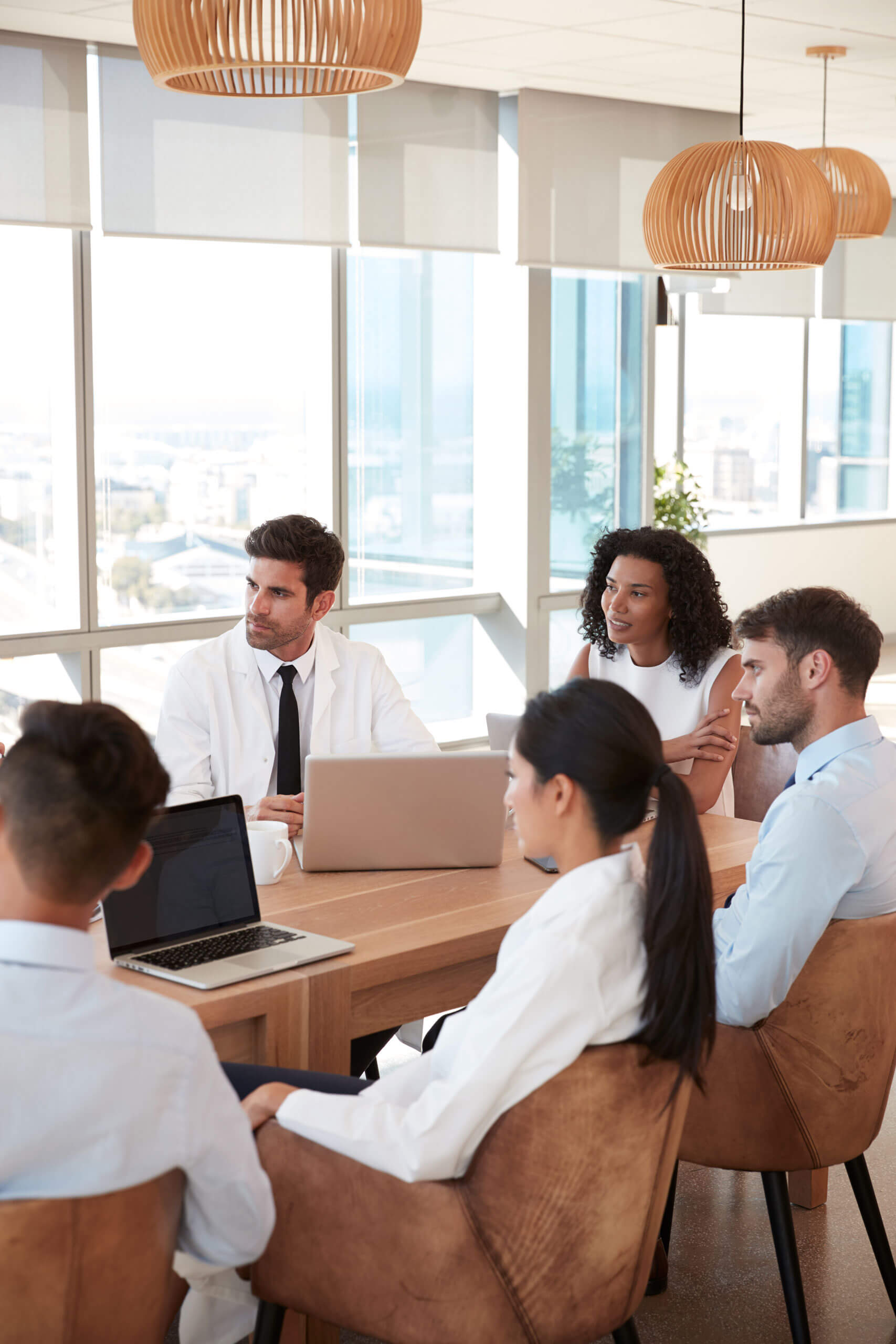 Doctors meeting around a table